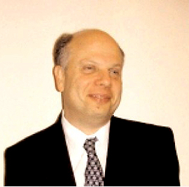 Head and shoulder shot of David Lepofsky, wearing a jacket and tie